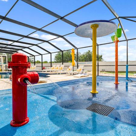 Luxury Orlando vacation home with private pool and kids splash pad play area near Disney